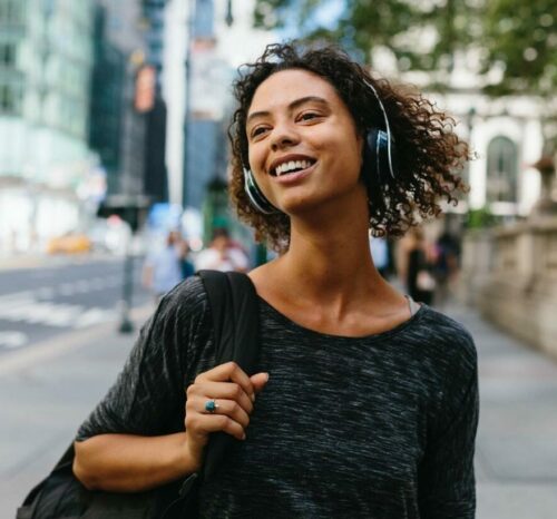 girl listening music in NYC